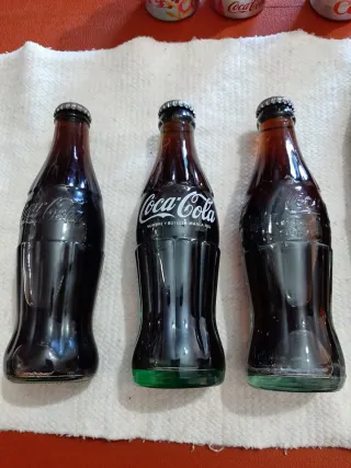 Collezione di bottigliette Coca-Cola