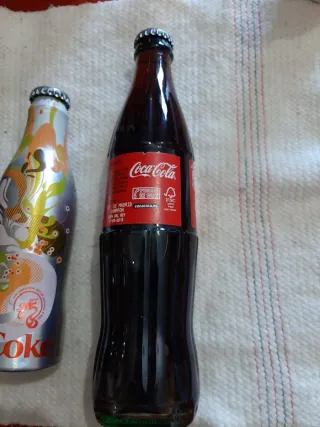 Collezione di bottigliette Coca-Cola