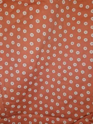 Pantalón chino naranja flores blancas T-L