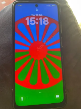 Móvil con fondo de rueda gitana