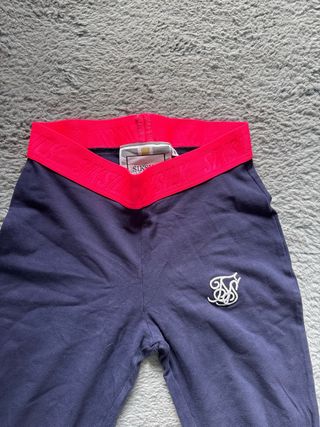 Leggings SikSilk Azul con Cintura Rosa