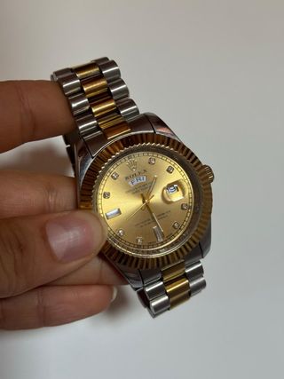 Reloj oro y plata