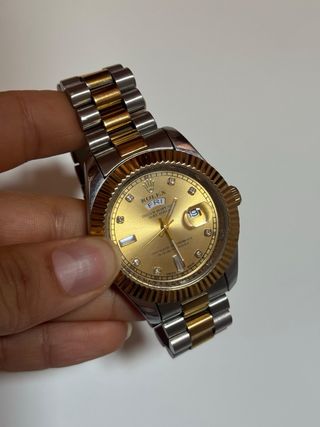 Reloj oro y plata