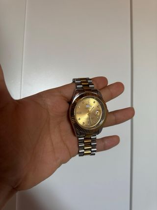 Reloj oro y plata