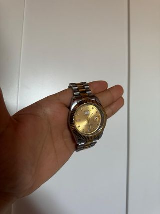 Reloj oro y plata