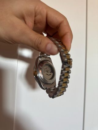 Reloj oro y plata