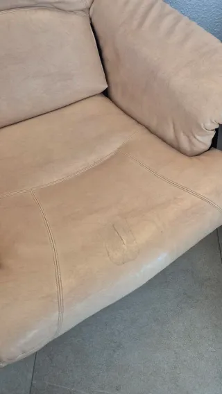 Sillón mecedora beige y multicolor