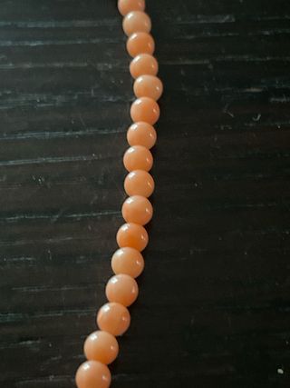 Collana perline rosa intenso