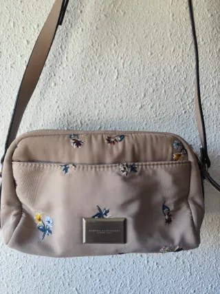 Bolso malva con flores