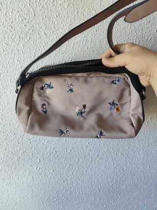 Bolso malva con flores