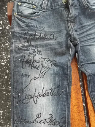 Jeans vintage vita bassa ricamati e brillantini