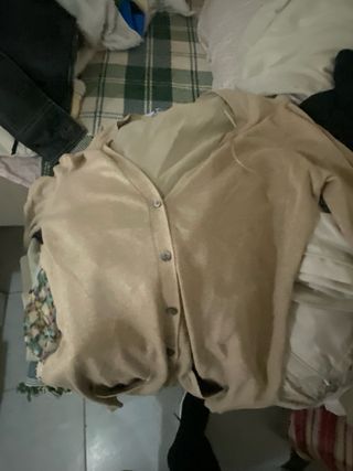 Rebeca morada y falda negra