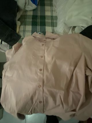 Rebeca morada y falda negra