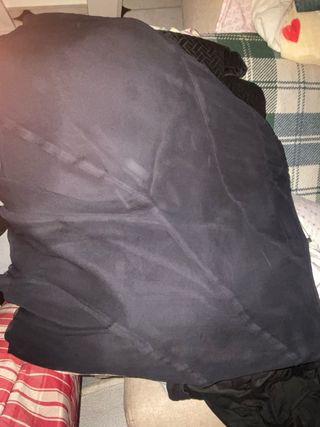 Rebeca morada y falda negra