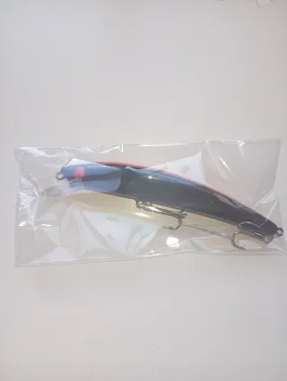 Señuelo de pesca negro y rosa