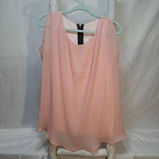 Blusa plisada rosa con cremallera