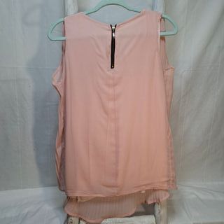 Blusa plisada rosa con cremallera