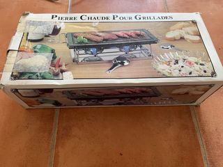 Piedra para cocinar con soporte metálico