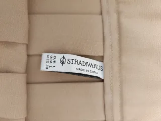 Falda Stradivarius beige plisada