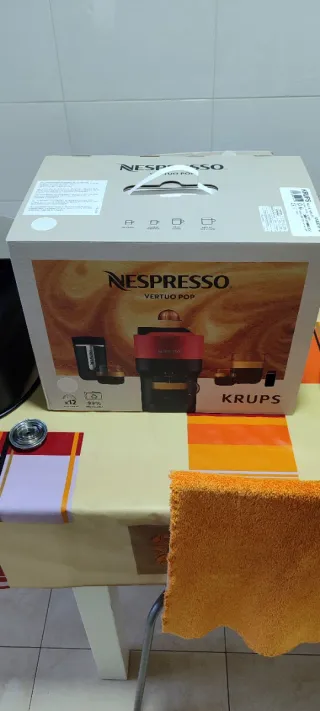 Cafetera Vertuo Blanca y Negra