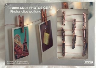 Grinalda luminosa com clipes para fotografias