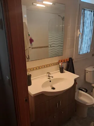 Mueble de lavabo y espejo