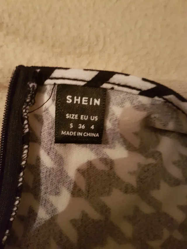 Vestido de licra con estampado pata de gallo