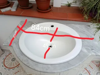 Lavabo de mármol y porcelana