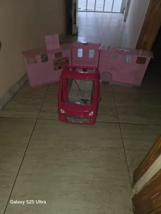 Casa rodante de juguete rosa para muñecas