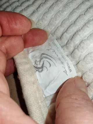 Tappetini da bagno beige e bianco