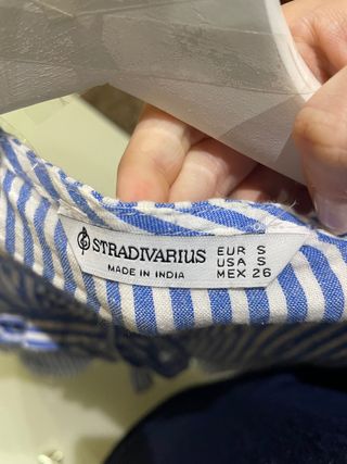 Blusa rayas azules y blancas con lazadas