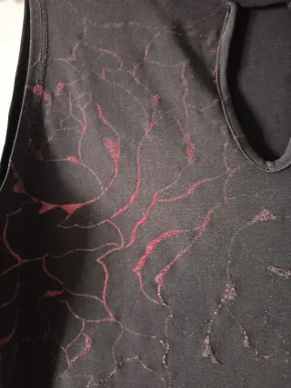 Blusa sin mangas cuello alto