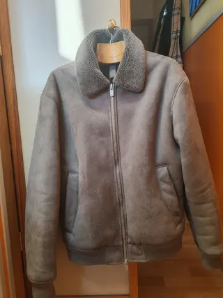 Chaqueta Zara gris con cuello de borreguito