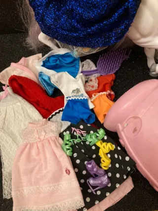Lotto bambole con vestiti