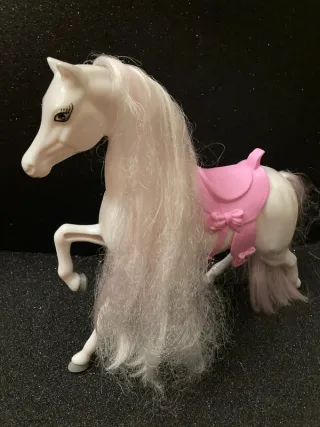 Lotto bambole con vestiti