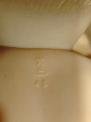 Antiguo muñeco bebé convert