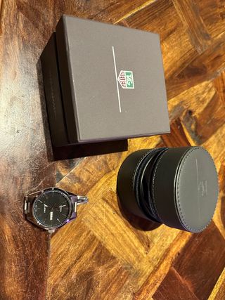 Reloj TAG Heuer Negro y Plateado.