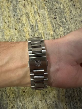 Reloj TAG Heuer Negro y Plateado.