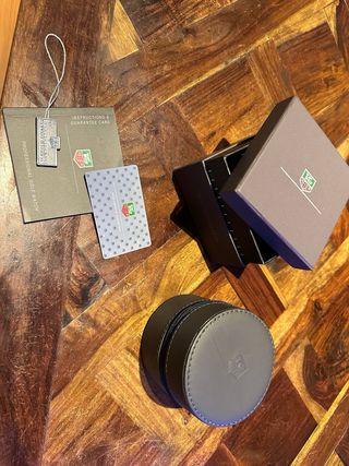 Reloj TAG Heuer Negro y Plateado.