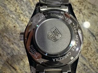 Reloj TAG Heuer Negro y Plateado.