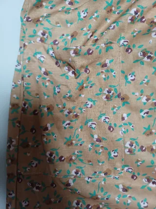 Batola marron floreado manga larga