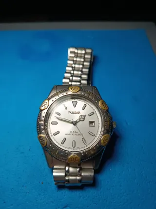 Reloj Pulsar Hombre Oro y Plata