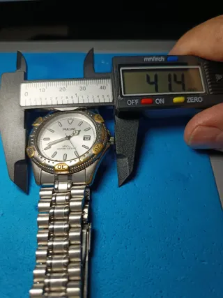 Reloj Pulsar Hombre Oro y Plata