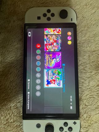 Nintendo Switch OLED + Mario Kart + Mario Wonder
