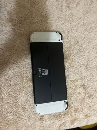 Nintendo Switch OLED + Mario Kart + Mario Wonder