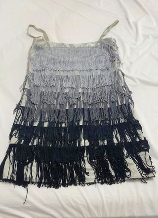 Vestido flecos estilo años 60