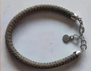 Pulseras plata y cordón