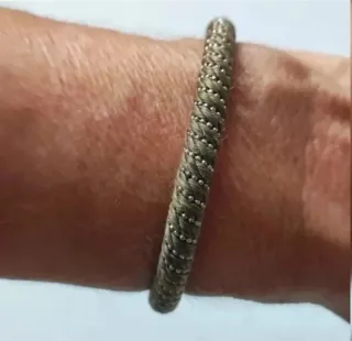 Pulseras plata y cordón