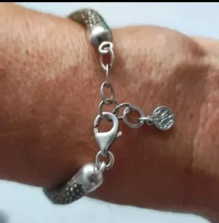 Pulseras plata y cordón