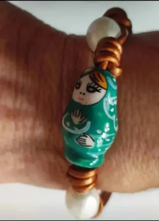 Pulseras plata y cordón